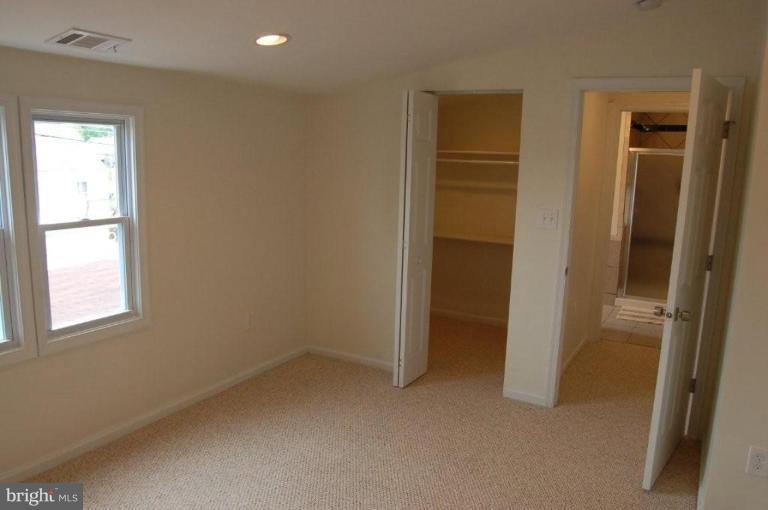 28 Crafton Road Essex, MD 21221 - Photo 8 of 13 an empty room with windows