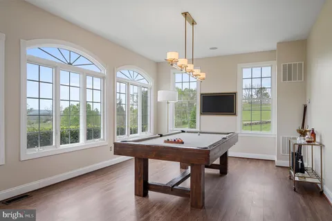 a view of a livingroom with furniture and a fireplace