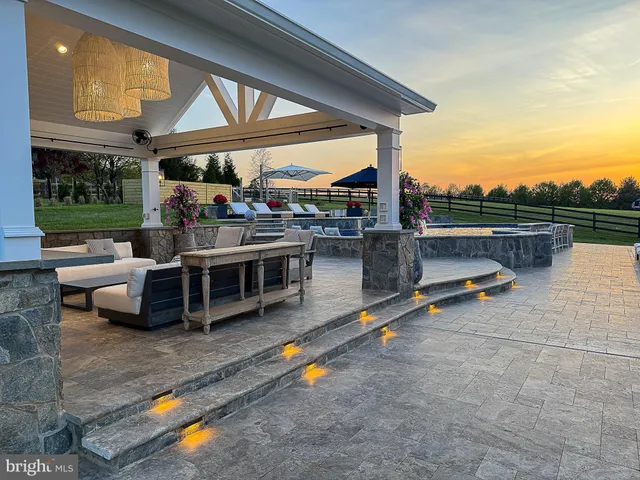 a view of a terrace with sitting area