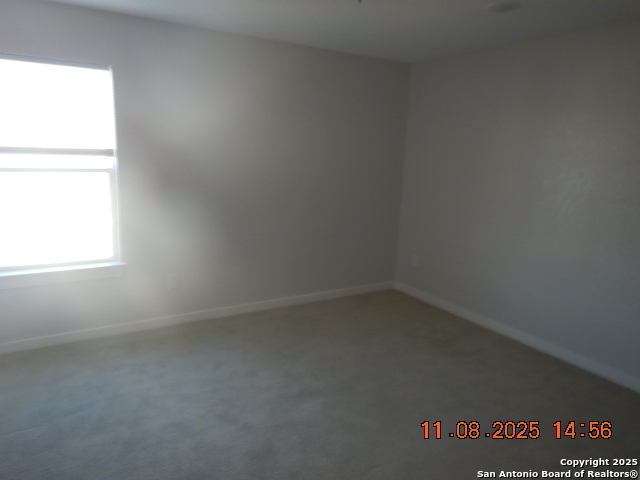 10639 Francisco Way Converse, TX 78109 - Photo 11 of 16 an empty room with a window