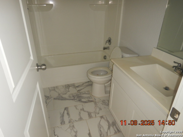 10639 Francisco Way Converse, TX 78109 - Photo 13 of 16 a bathroom with a sink and a toilet