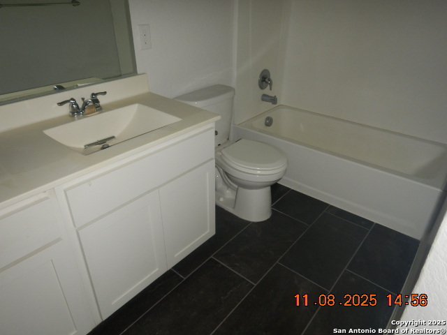 10639 Francisco Way Converse, TX 78109 - Photo 10 of 16 a bathroom with a toilet and a sink