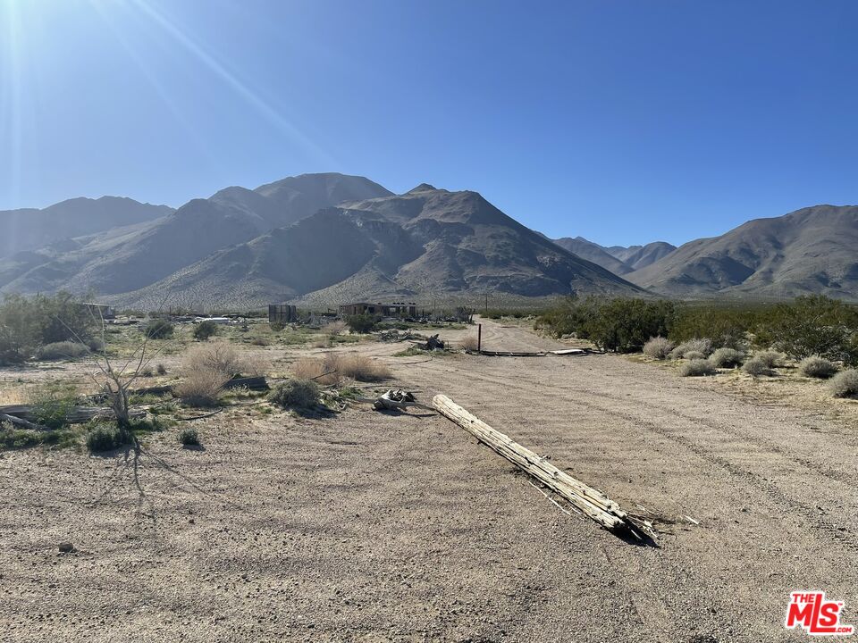 401 Sterling Road Inyokern, CA 93527 - Photo 7 of 37 a view of a dry field with mountains in the background