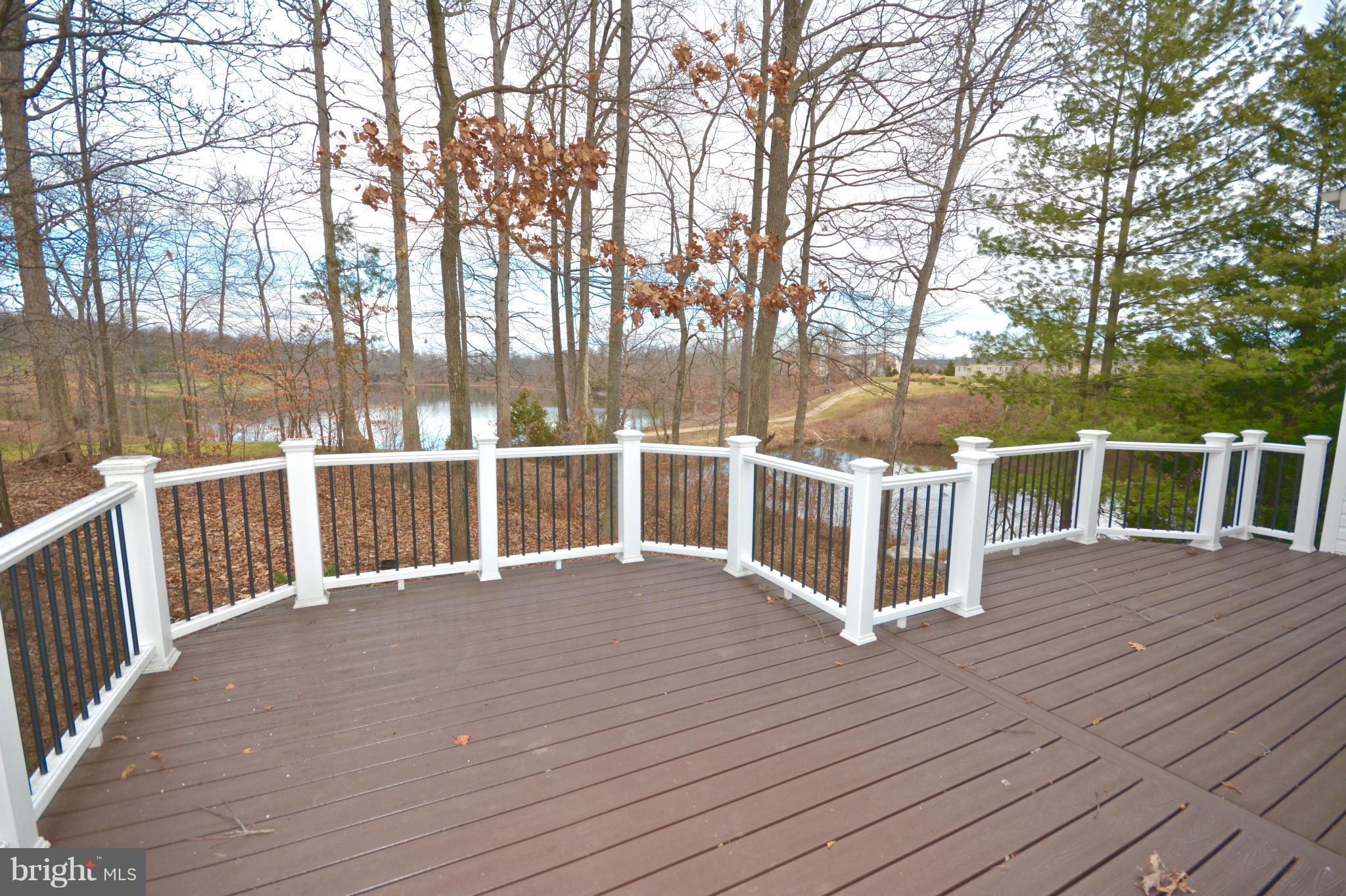 14468 Clubhouse Road Gainesville, VA 20155 - Photo 29 of 30 a view of a balcony with wooden floor and fence
