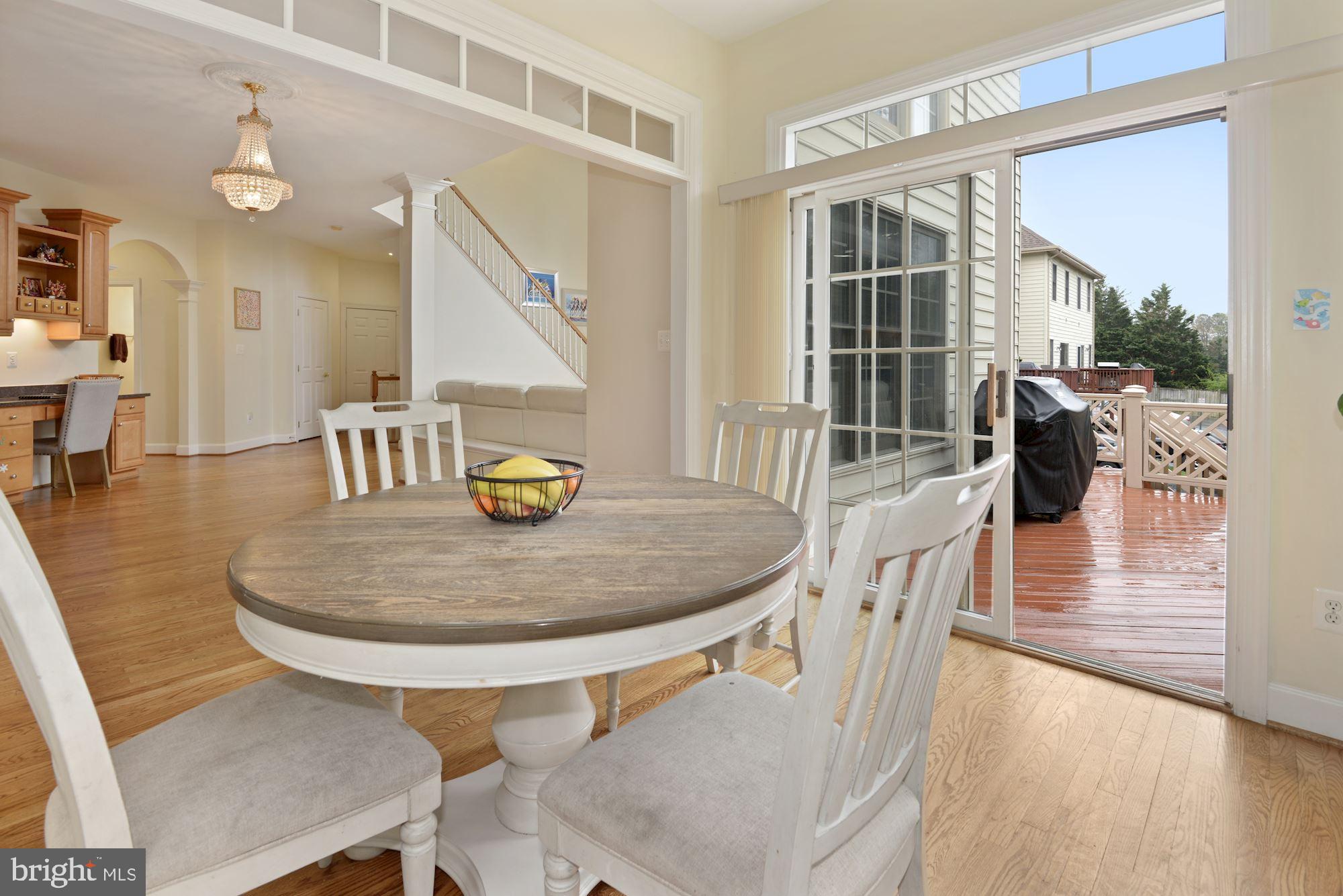 1406 Stanbridge Place Vienna, VA 22182 - Photo 11 of 48 Breakfast room opens to deck with mature trees!