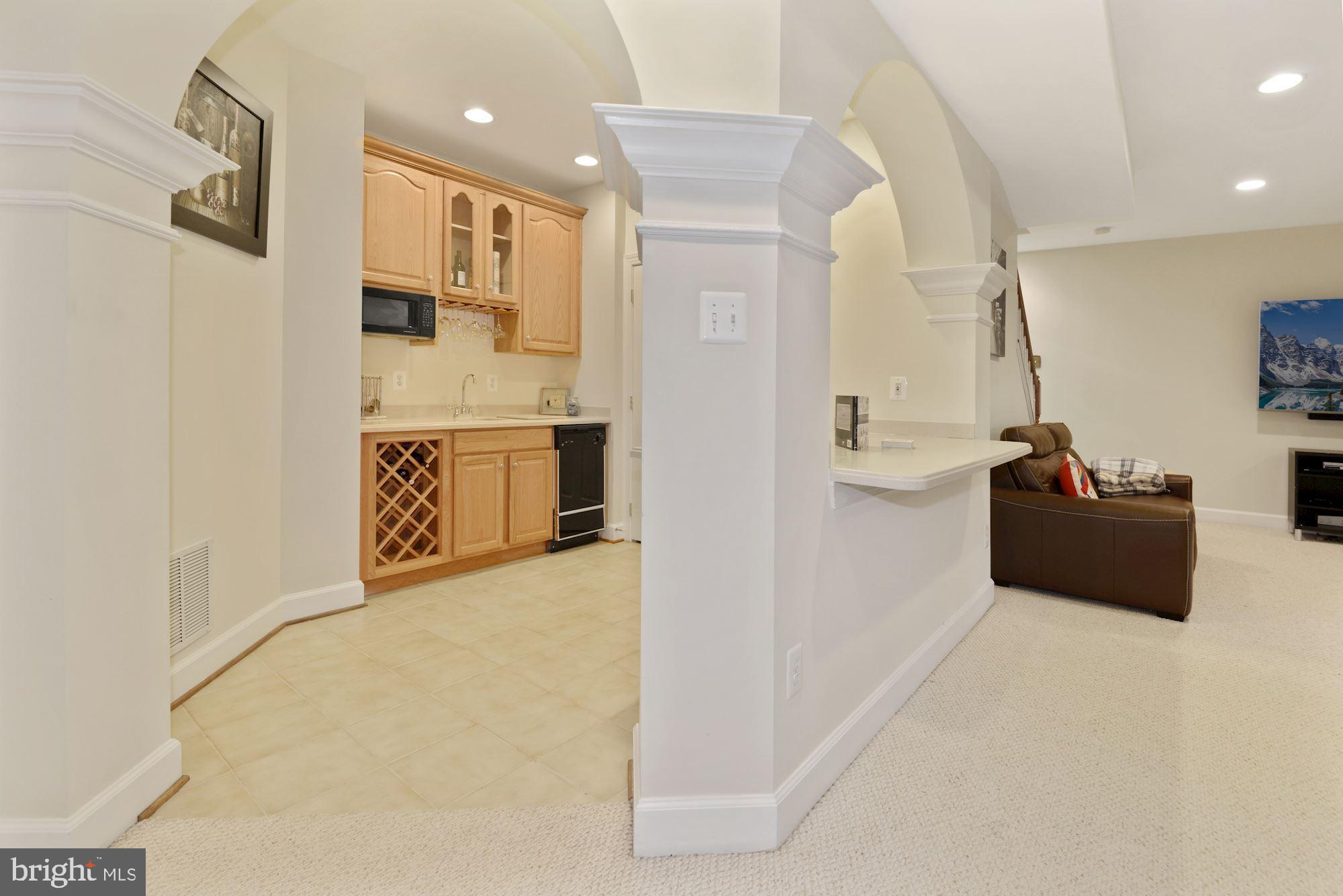 1406 Stanbridge Place Vienna, VA 22182 - Photo 33 of 48 Dishwasher, sink, microwave, fridge! Fun!