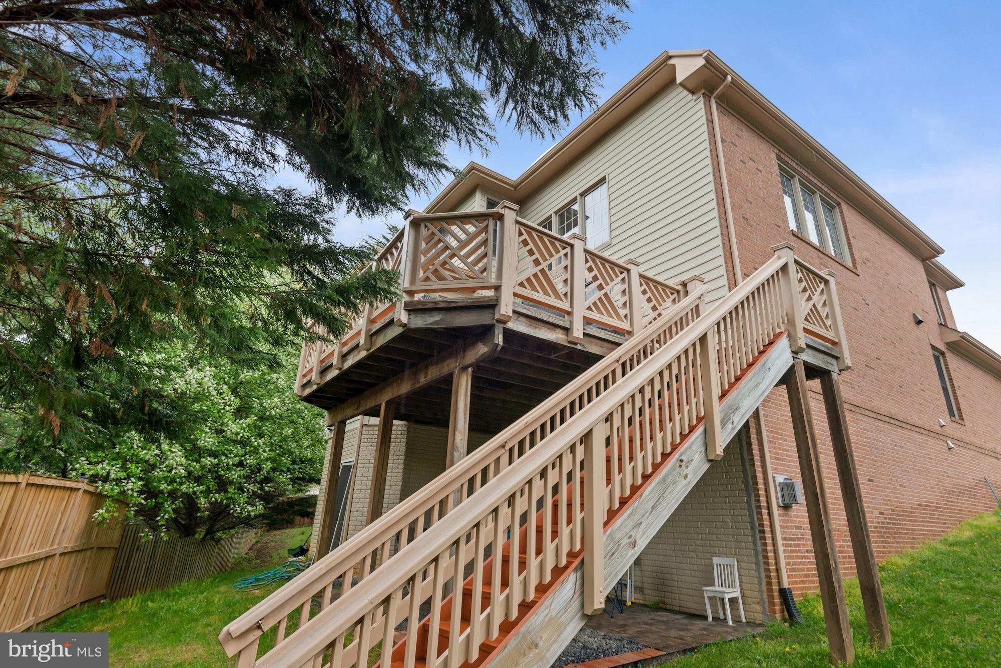 1406 Stanbridge Place Vienna, VA 22182 - Photo 46 of 48 Staircase to backyard and stone patio!