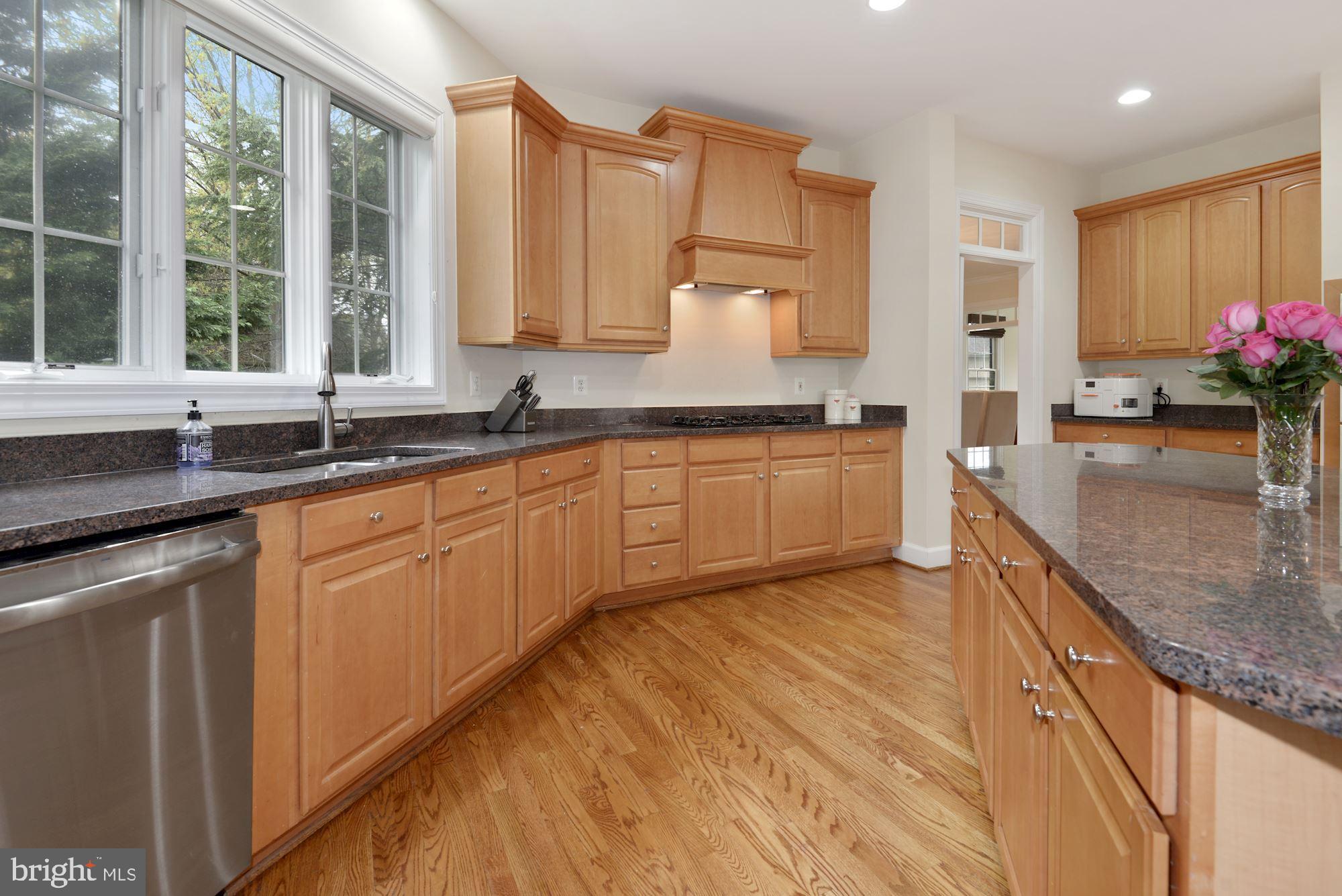 1406 Stanbridge Place Vienna, VA 22182 - Photo 6 of 48 Stainless steel appliances and granite counters
