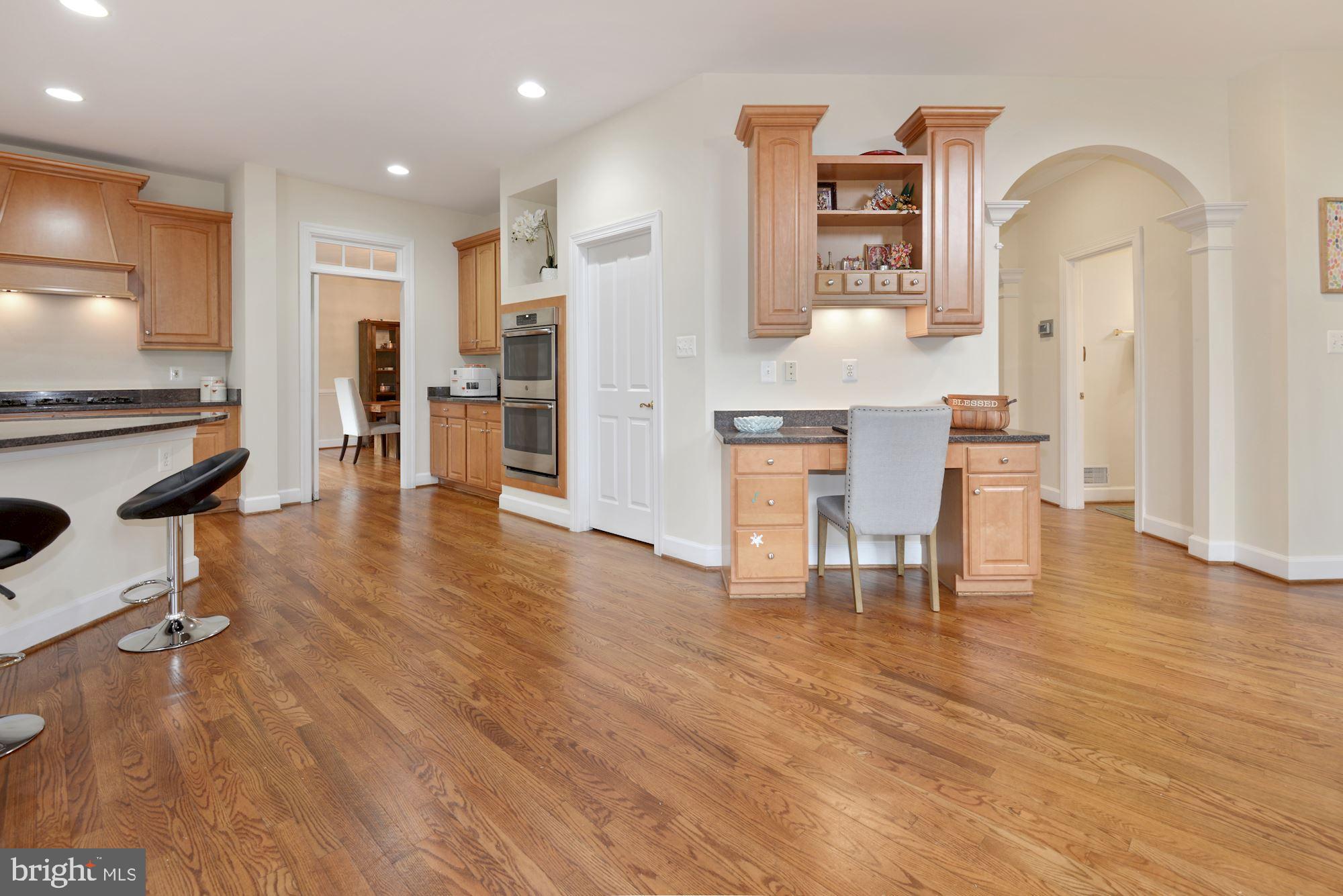1406 Stanbridge Place Vienna, VA 22182 - Photo 7 of 48 Desk and more cabinets in kitchen