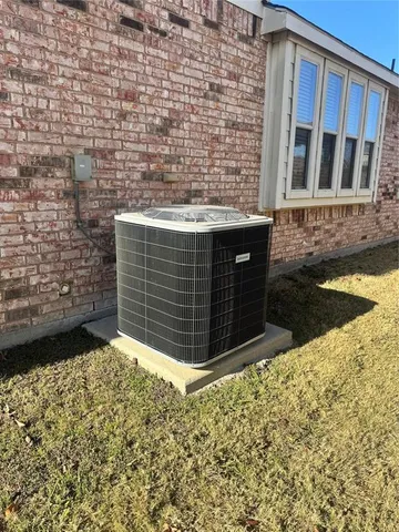 a view of a house with backyard porch and furniture