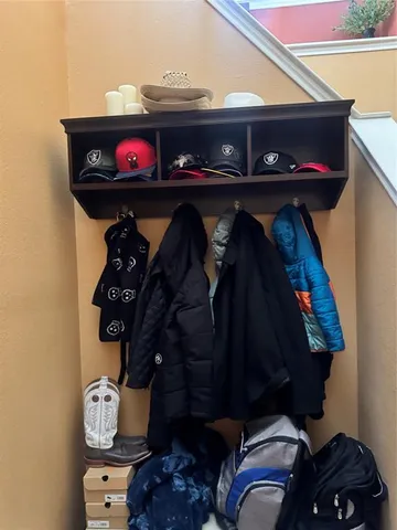 a store room with lots of different colored cloths