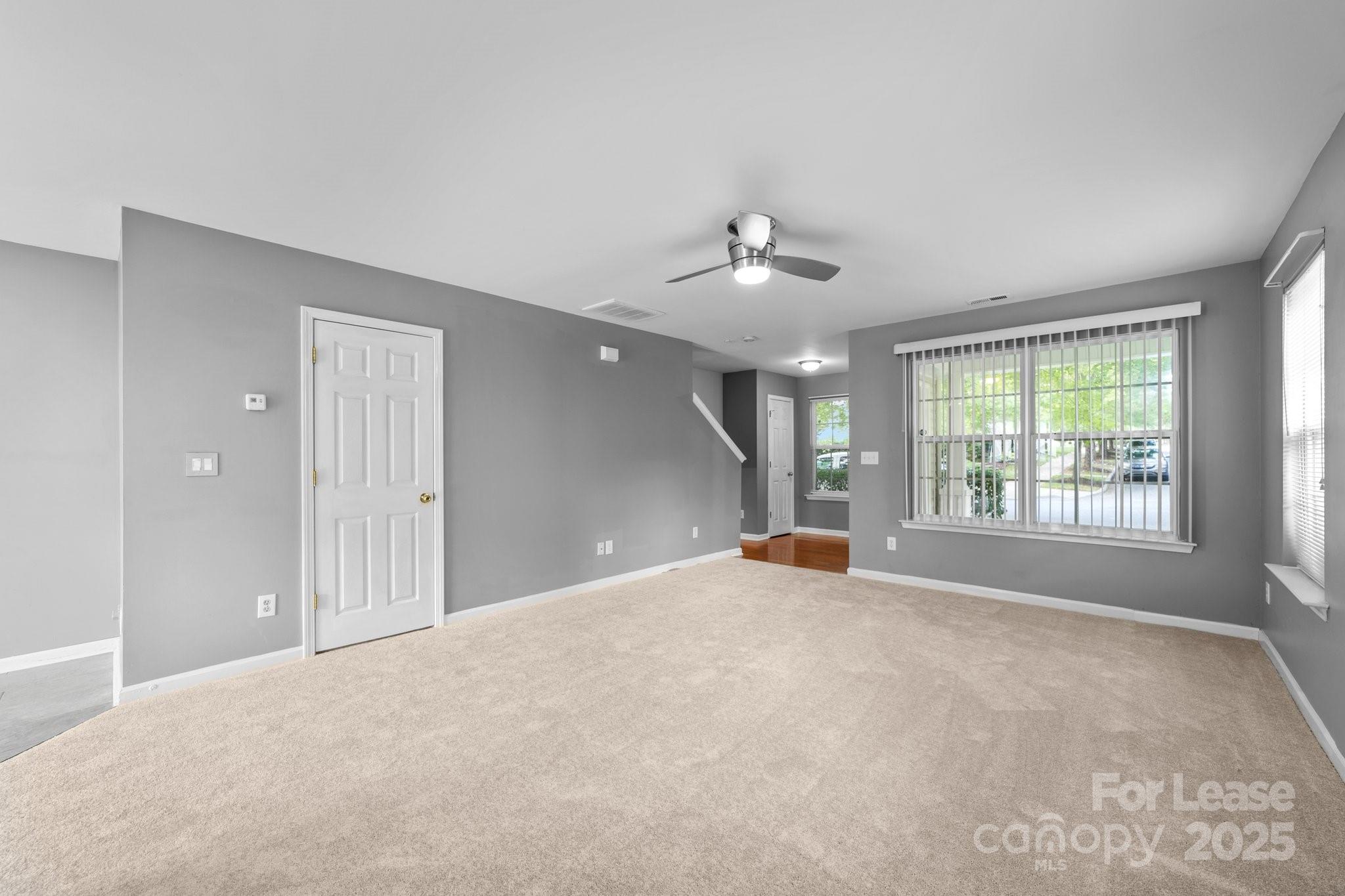 17562 Caldwell Track Drive Cornelius, NC 28031 - Photo 11 of 38 a view of an empty room with a window