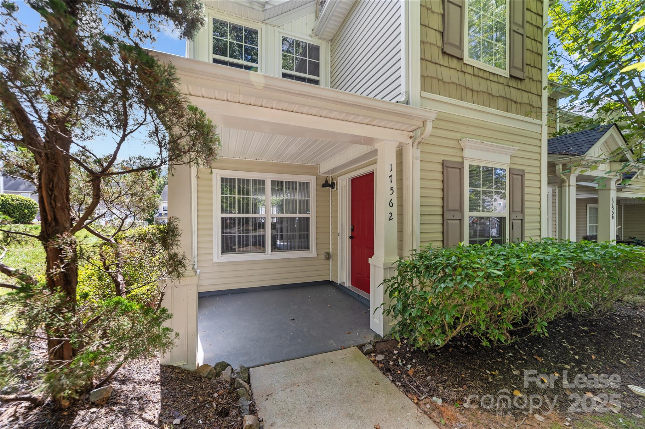 17562 Caldwell Track Drive Cornelius, NC 28031 - Photo 32 of 38 a front view of a house with a yard
