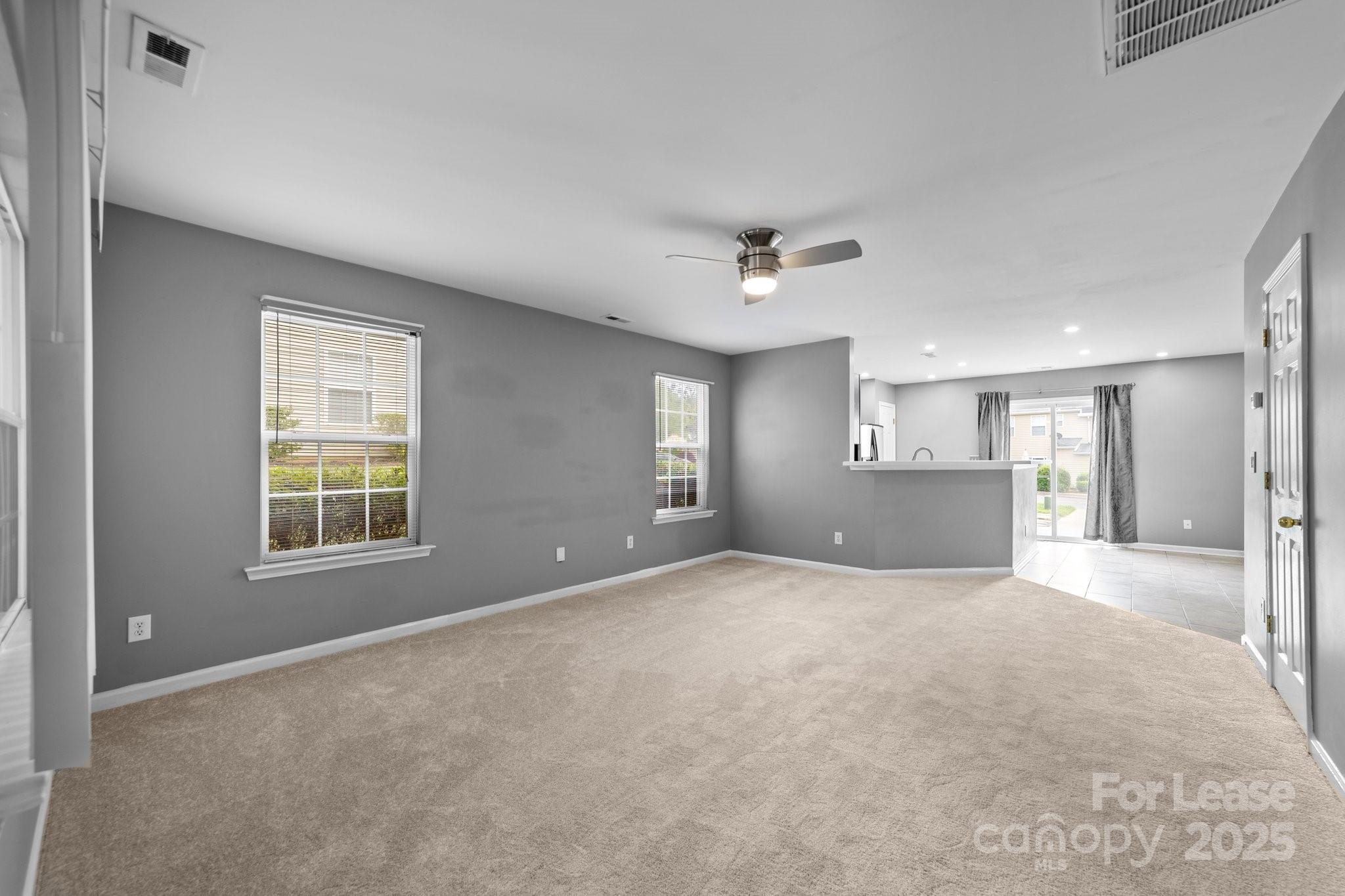 17562 Caldwell Track Drive Cornelius, NC 28031 - Photo 7 of 38 a view of an empty room with a window