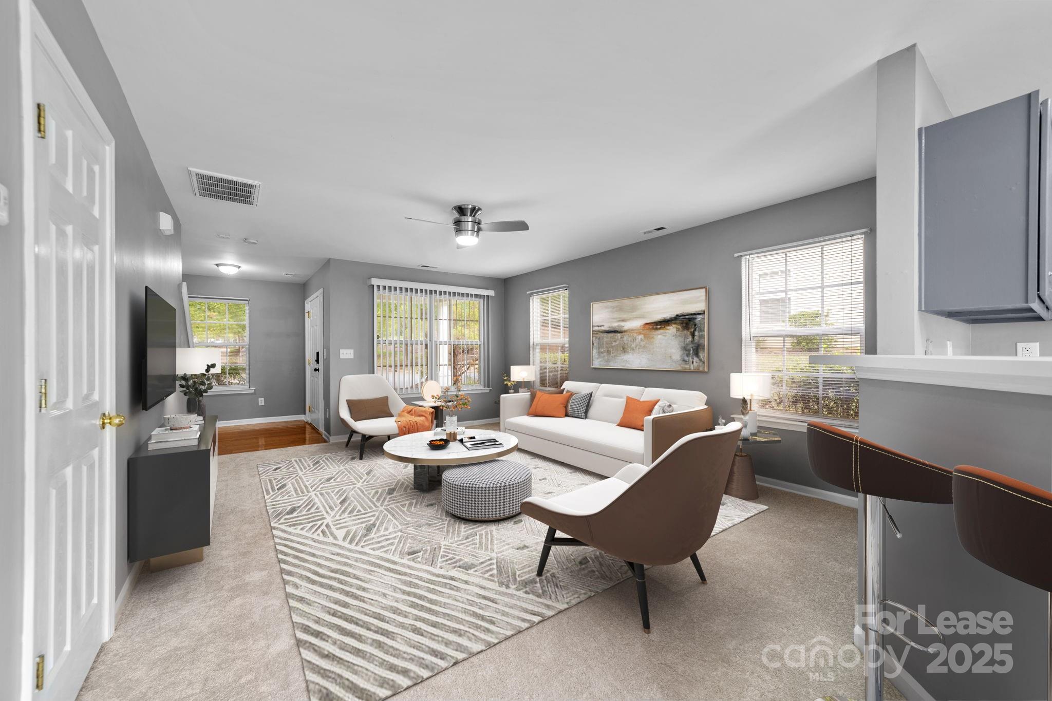 17562 Caldwell Track Drive Cornelius, NC 28031 - Photo 10 of 38 a living room with furniture and a large window