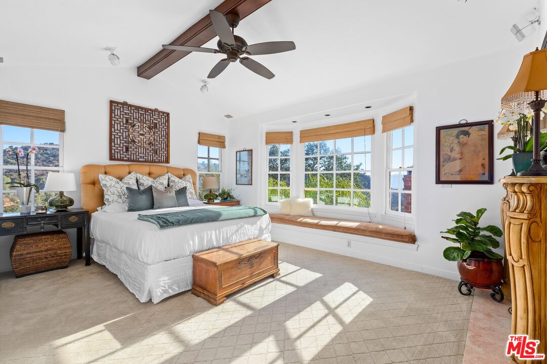2300 Gardner Place Glendale, CA 91206 - Photo 9 of 20 a spacious bedroom with a bed couch and window