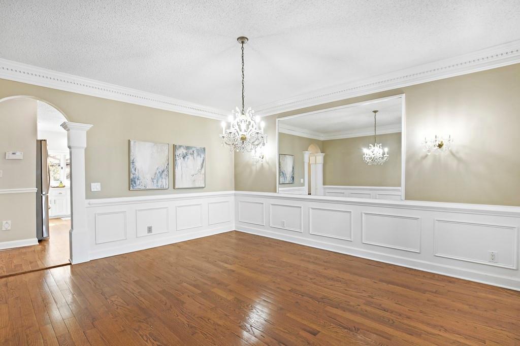 4409 Windsor Oaks Circle Marietta, GA 30066 - Photo 19 of 90 a view of a kitchen with wooden floor and a large window