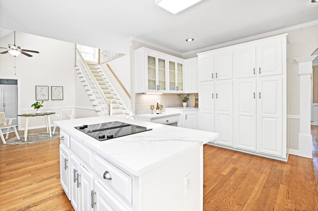 4409 Windsor Oaks Circle Marietta, GA 30066 - Photo 25 of 90 a kitchen with a stove a sink and a refrigerator