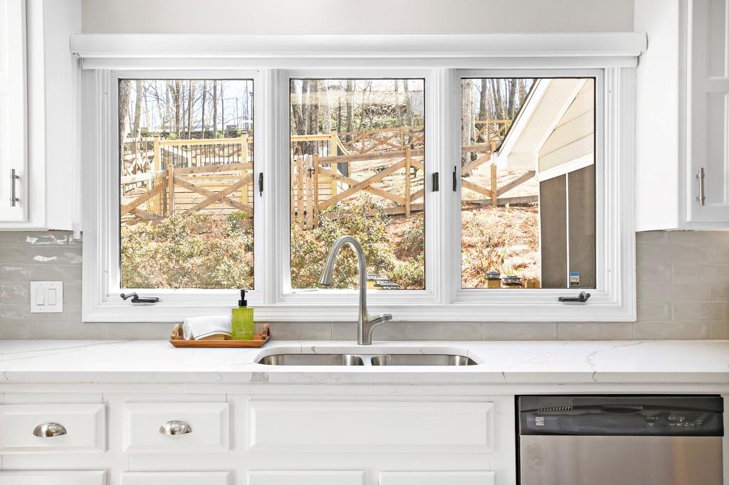 4409 Windsor Oaks Circle Marietta, GA 30066 - Photo 29 of 90 a kitchen with a sink and a window