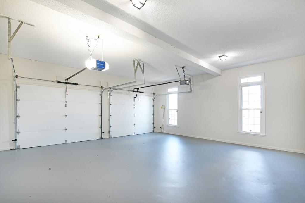 4409 Windsor Oaks Circle Marietta, GA 30066 - Photo 35 of 90 an empty room with wooden floor and windows