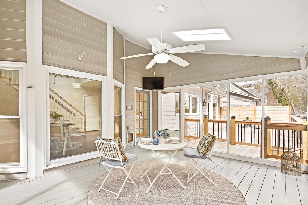 4409 Windsor Oaks Circle Marietta, GA 30066 - Photo 4 of 90 a view of a dining room with furniture wooden floor and chandelier