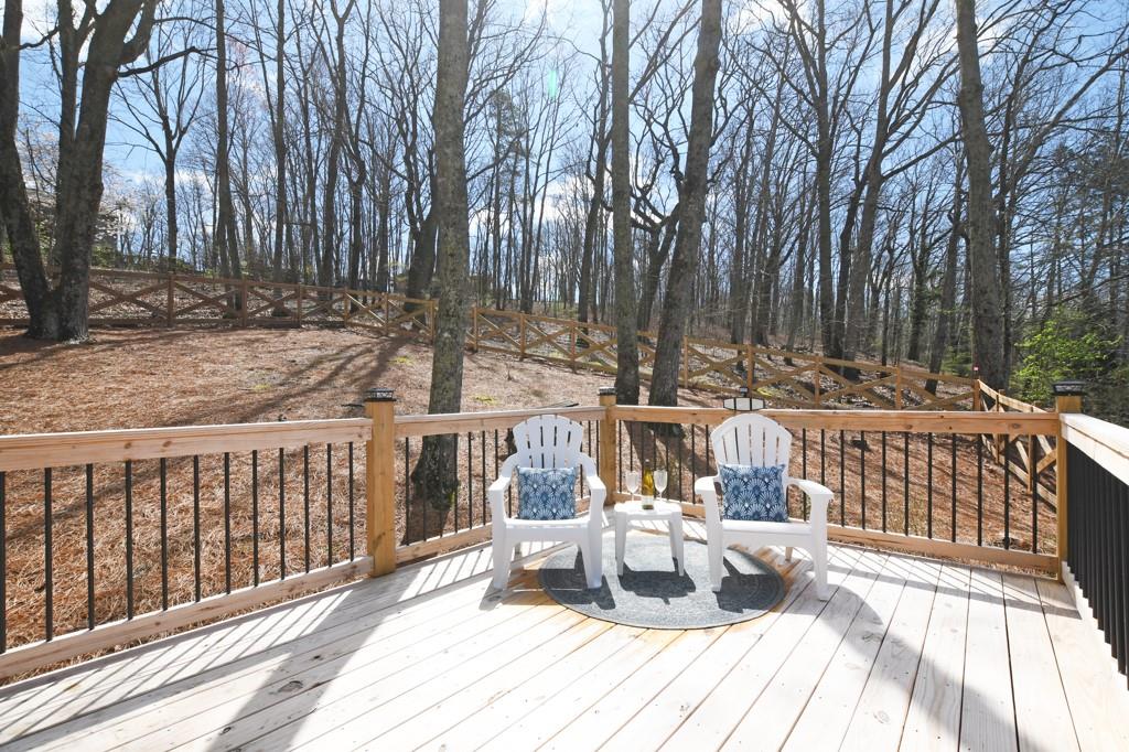 4409 Windsor Oaks Circle Marietta, GA 30066 - Photo 5 of 90 a view of balcony with wooden floor and outdoor seating