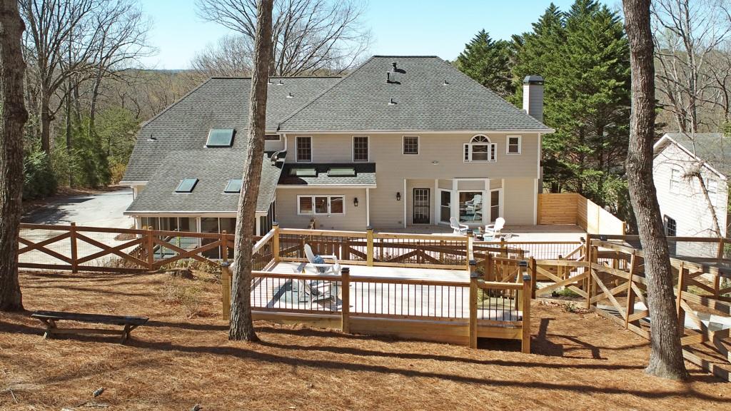 4409 Windsor Oaks Circle Marietta, GA 30066 - Photo 64 of 90 front view of a house with a wrought fence