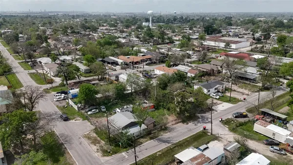 an aerial view of a city with lots of residential buildings