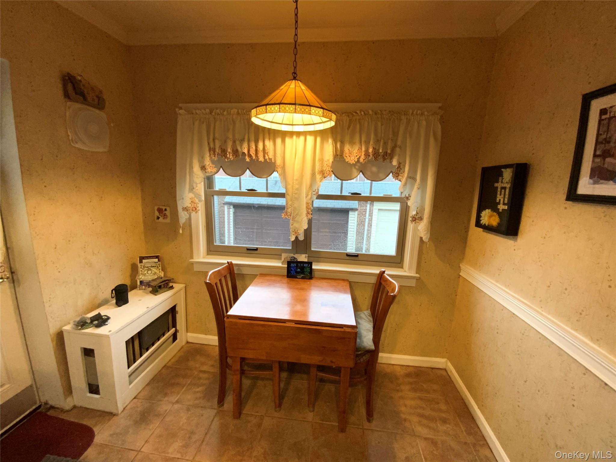 47-05 189th Street Queens, NY 11358 - Photo 13 of 41 a dining room with a table and chairs