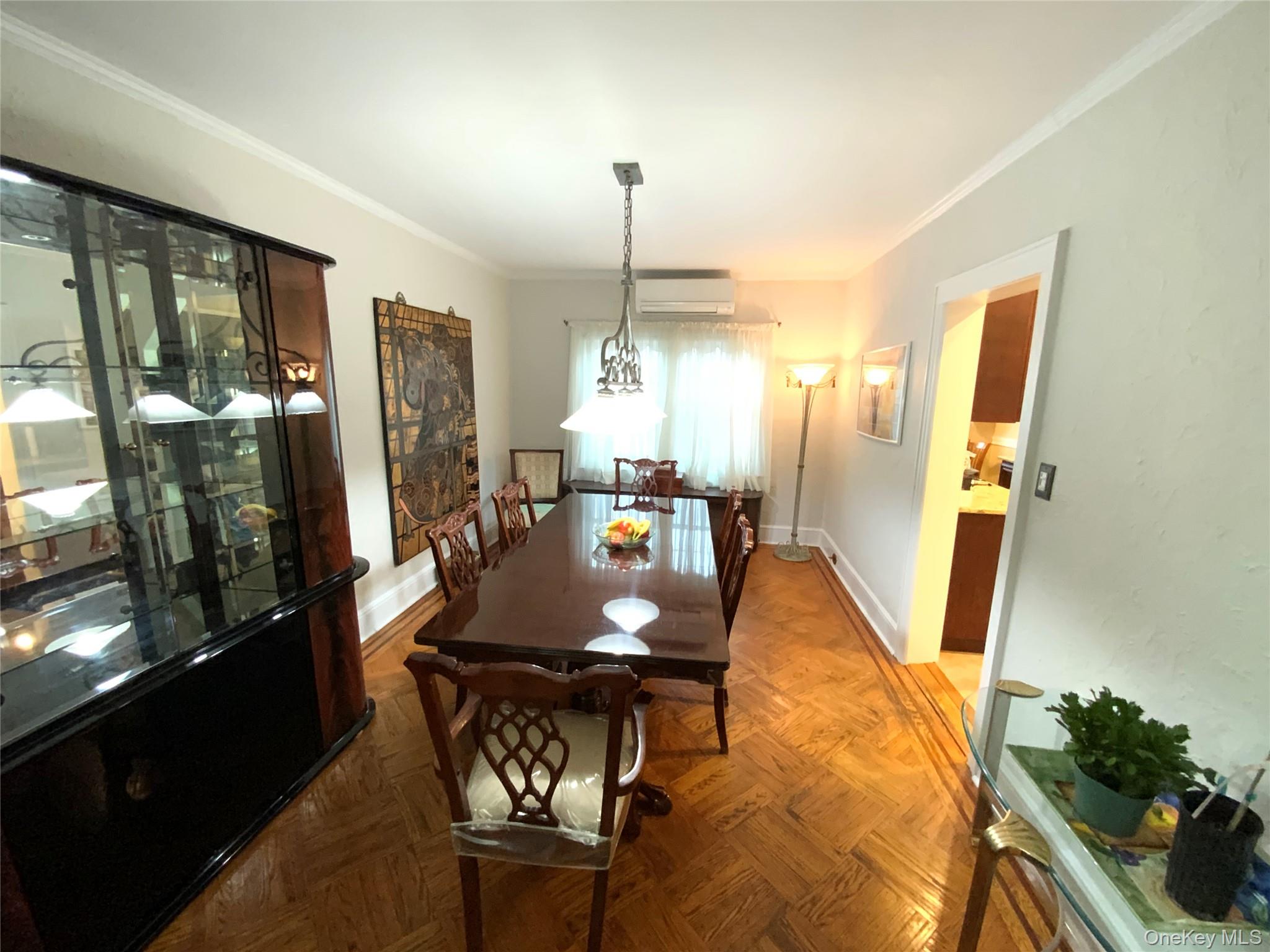 47-05 189th Street Queens, NY 11358 - Photo 8 of 41 a dining room with furniture and wooden floor