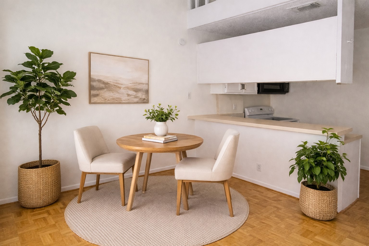 a dining room with furniture and potted plant