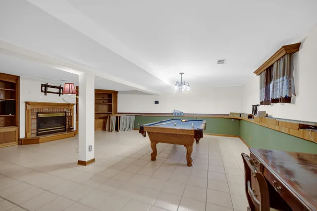 a room with furniture and a fireplace