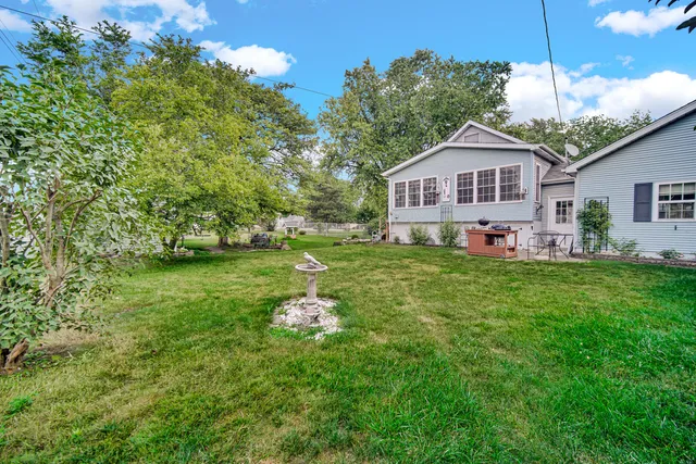 a view of a house with a back yard