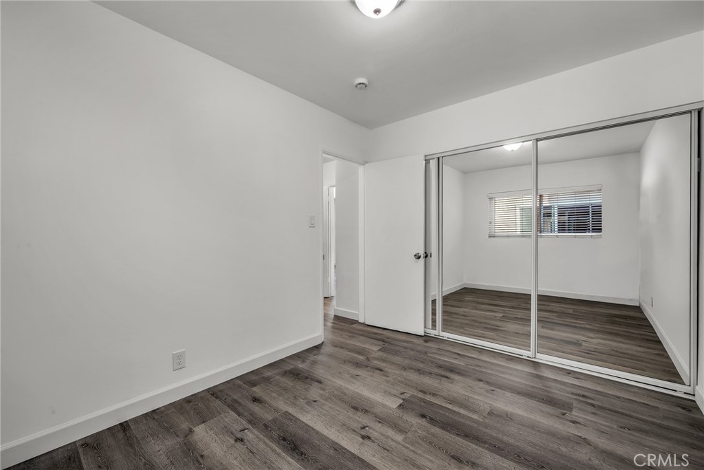 3706 Redondo Beach Boulevard, Unit B Torrance, CA 90504 - Photo 14 of 18 a view of wooden floor and windows in a room
