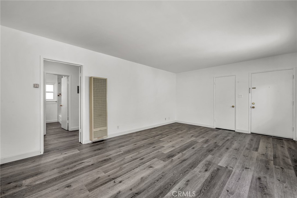 3706 Redondo Beach Boulevard, Unit B Torrance, CA 90504 - Photo 6 of 18 a view of an empty room and wooden floor