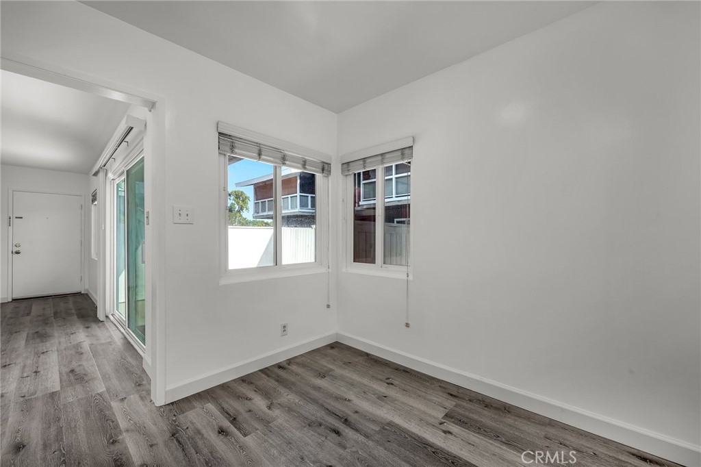 3706 Redondo Beach Boulevard, Unit B Torrance, CA 90504 - Photo 7 of 18 a view of empty room with wooden floor and fan