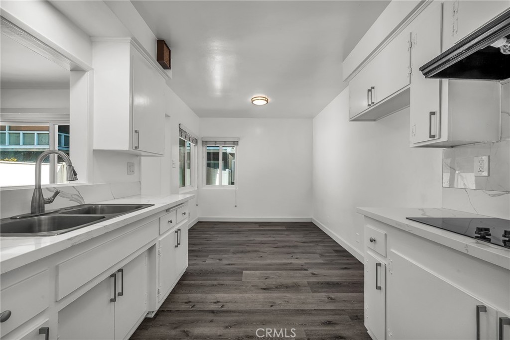 3706 Redondo Beach Boulevard, Unit B Torrance, CA 90504 - Photo 9 of 18 a kitchen that has a sink and a stove