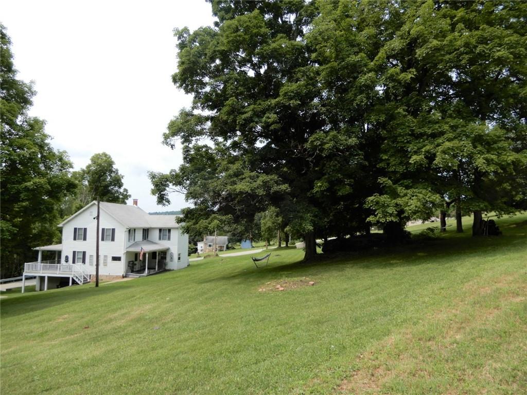 590 Imel Road Normalville, PA 15469 - Photo 26 of 30 a view of a house with a yard and sitting area