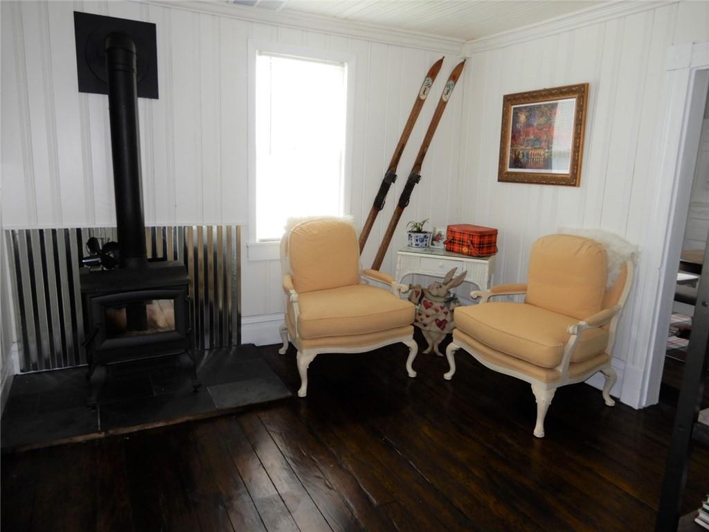 590 Imel Road Normalville, PA 15469 - Photo 6 of 30 a living room with furniture and a fireplace