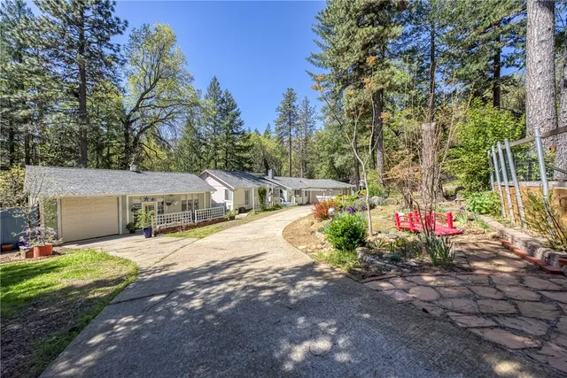 a front view of a house with porch patio and dining space