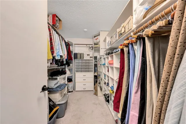 a living room with furniture and wooden floors
