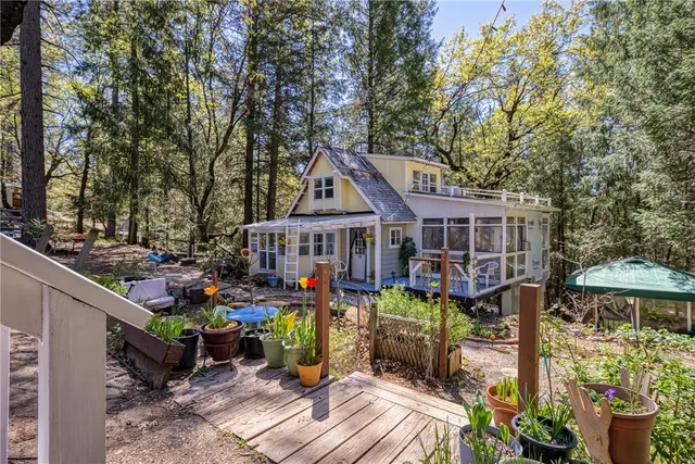 a view of a livingroom with furniture and a chandelier