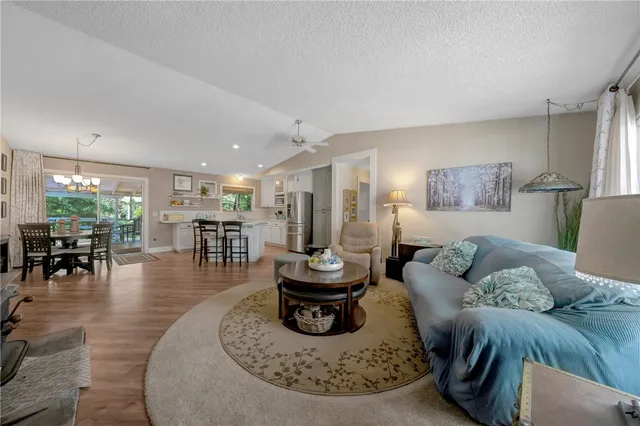 a view of kitchen with cabinets and wooden floor