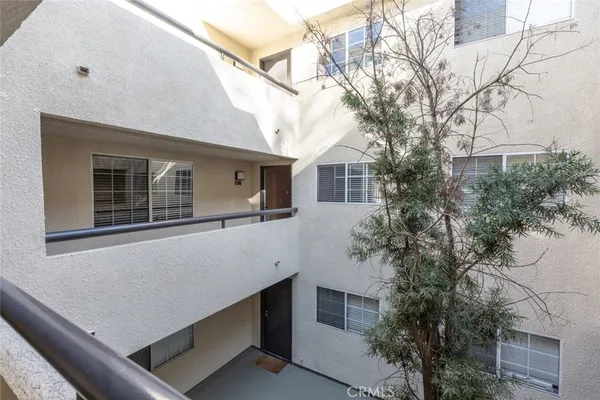 a house with trees in front of it