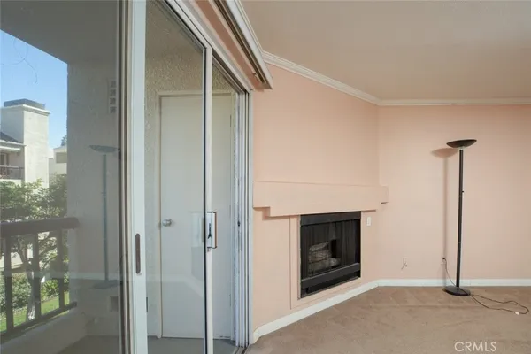 a view of a livingroom with a fireplace