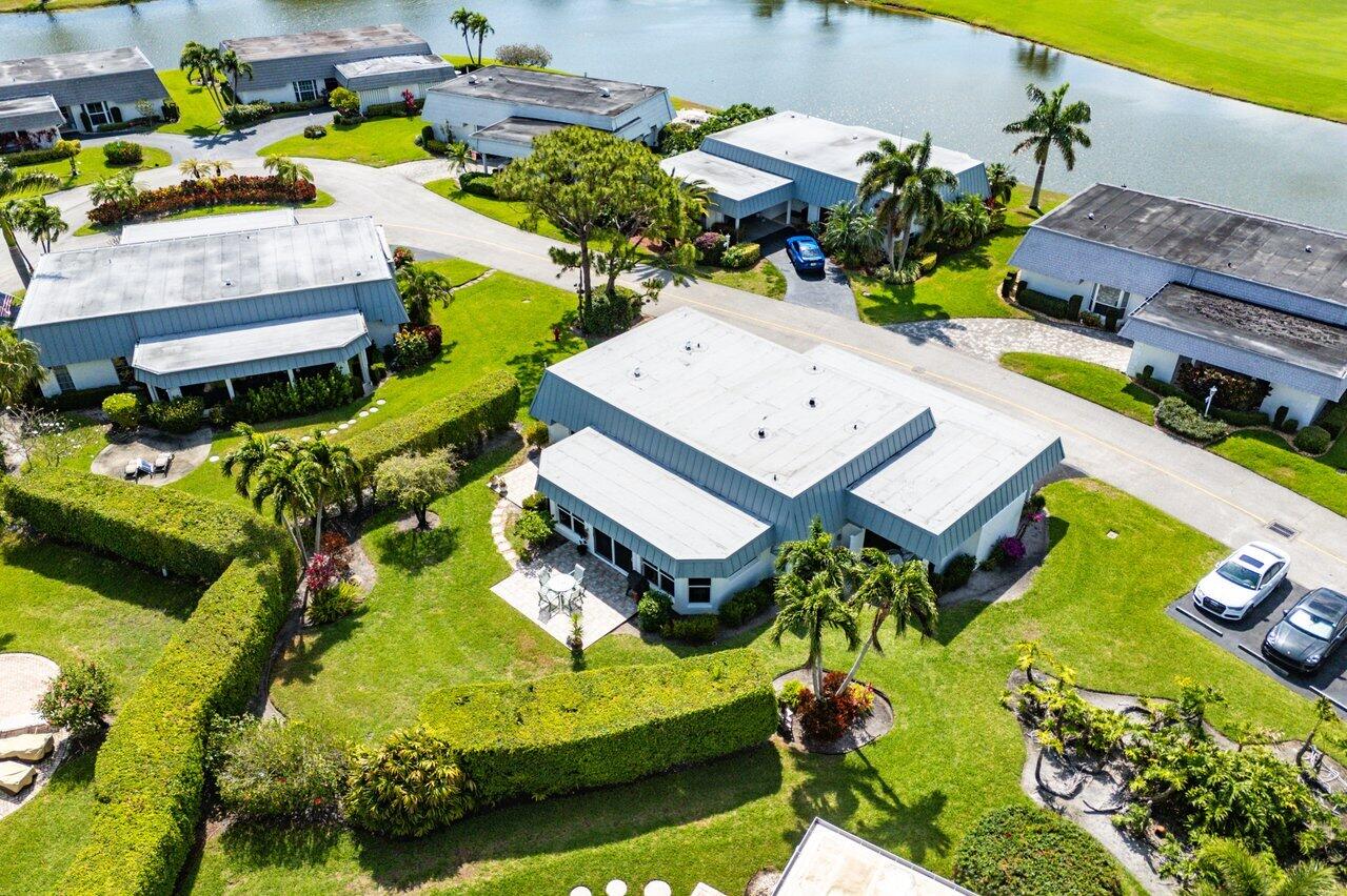 401 French Royale Circle Atlantis, FL 33462 - Photo 41 of 47 an aerial view of a house with yard swimming pool and outdoor seating