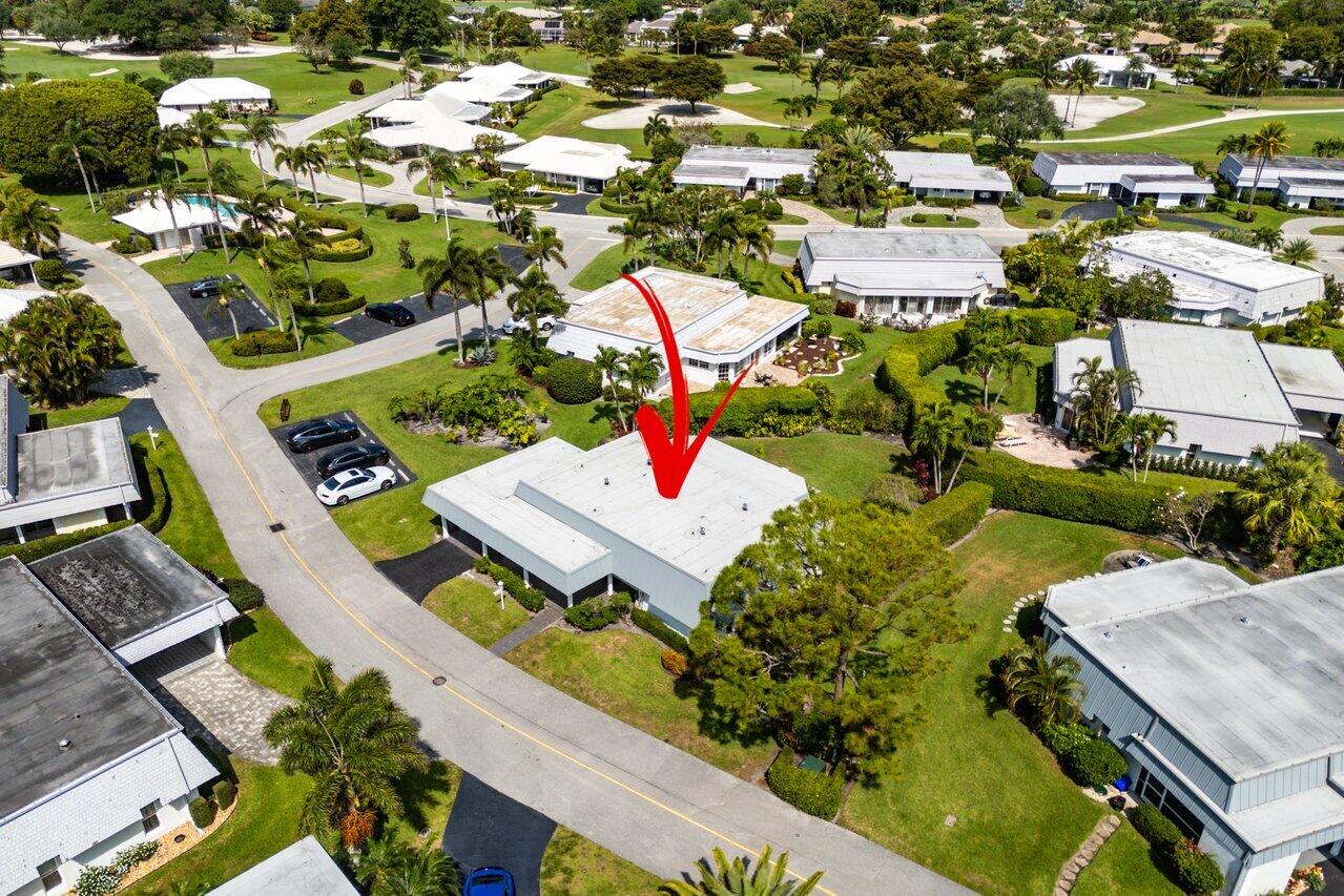 401 French Royale Circle Atlantis, FL 33462 - Photo 43 of 47 an aerial view of residential houses with outdoor space