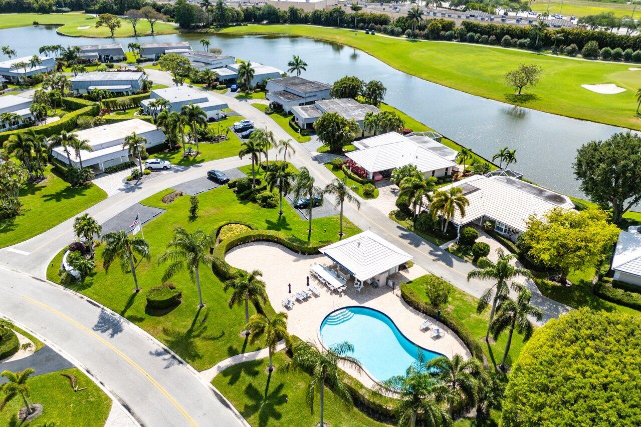 401 French Royale Circle Atlantis, FL 33462 - Photo 45 of 47 an aerial view of a house with a swimming pool