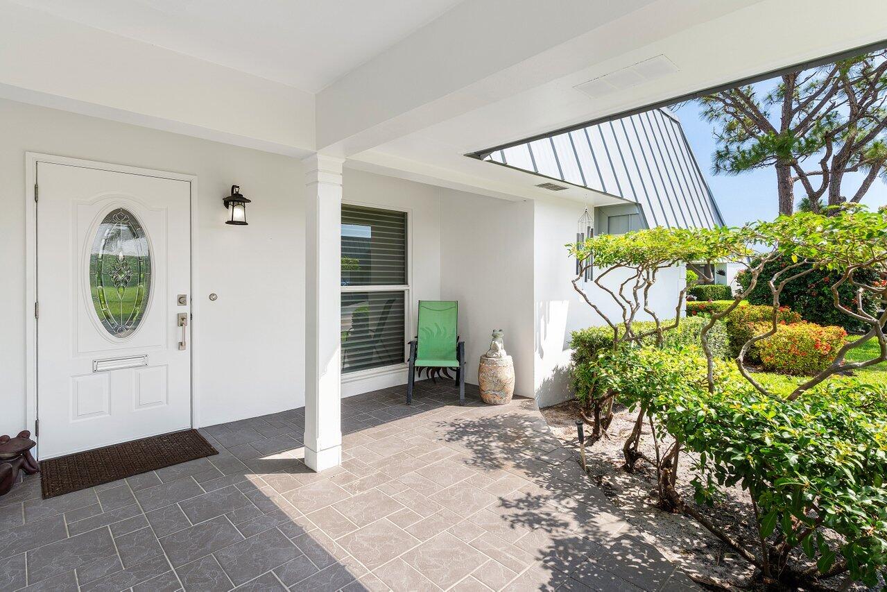 401 French Royale Circle Atlantis, FL 33462 - Photo 5 of 47 a view of a entryway door