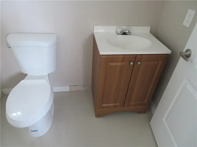 a room with window and a flat screen tv